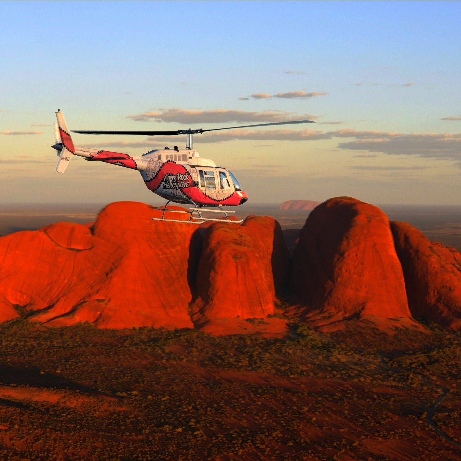 Helicopter above Ayers Rock Resort