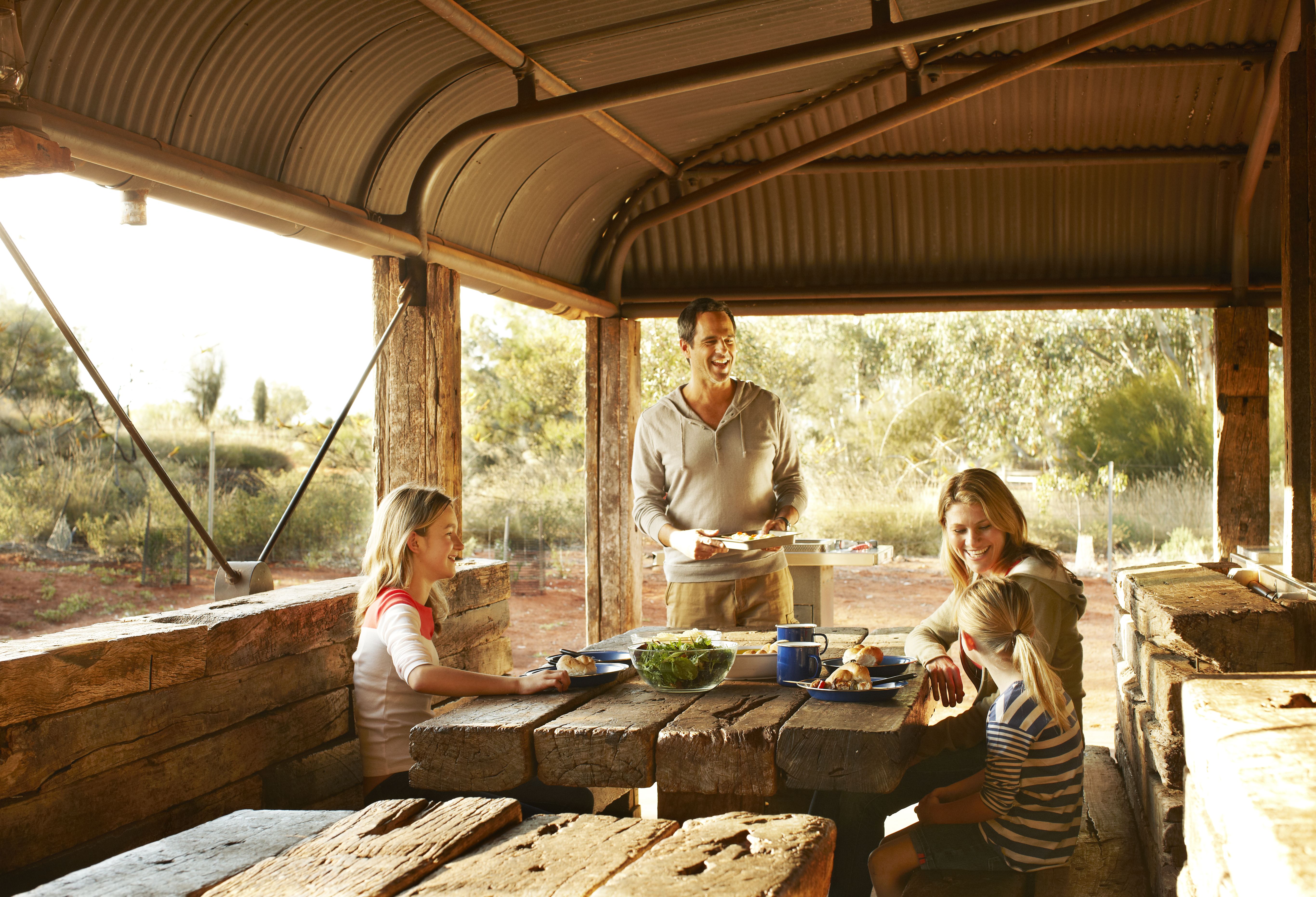 family having a picnic in uluru