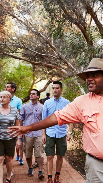 Tour Guide giving Garden Walk tour at Ayers Rock Resort