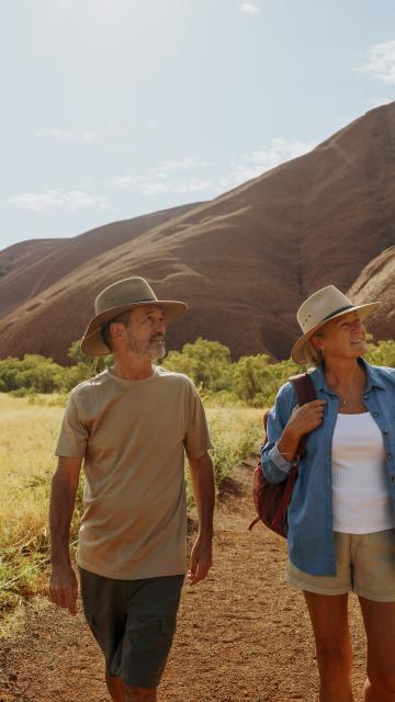 A couple on a morning walk near Uluru